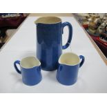 Three Moorcroft Pottery Blue Speckled Jugs, 15.5cms, 7.5cms and 6.5cms high, impressed Moorcroft