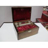 XIX Century Rosewood Travelling Vanity Box, with oval mother of pearl escutcheon, fitted interior