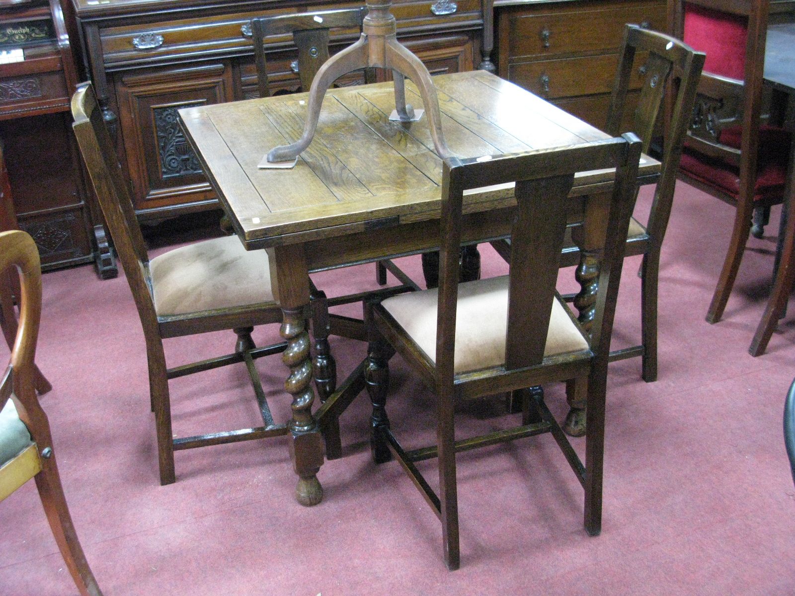 1920's Oak Draw-Leaf Table, on barely twist and block supports, united by a x stretcher; together