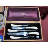 A Joseph Rodgers & Sons Five Piece Carving Set, each piece with ivory handles and silver bands,