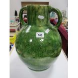 A Late Victorian Twin Handled Vase, of globular form, tall neck with applied handles, all in a