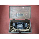 A Mid XX Century British Field Telephone, in wooden case.