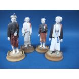A Set of Four Early XX Century Burmese Bone Painted Figures, in traditional costume, three