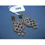 A Pair of Continental Style Diamond Set Drop Earrings, of openwork scroll design, each set