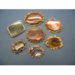 XIX Century and Later Hardstone and Other Brooches, collet set. (7)