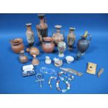 A Collection of Egyptian Artefacts, including a single handled pottery ewer, decorated with a seated