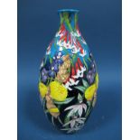 A Moorcroft Pottery Vase, tubelined and decorated with the Australian Garden design from the Great