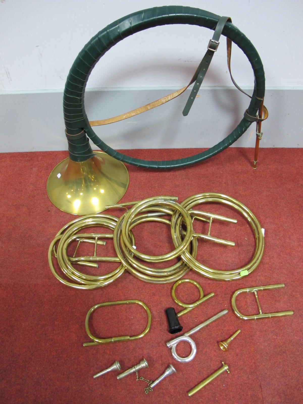 A Brass Posthorn, a quantity of French horn and other brass and plated instrument parts.