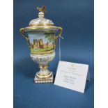 A Coalport Bone China Vase and Cover, of two handled urn form with eagle surmount, painted by