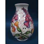 A Moorcroft Pottery Vase, decorated with the Butterfly design by Emma Bossons, shape 7/7,