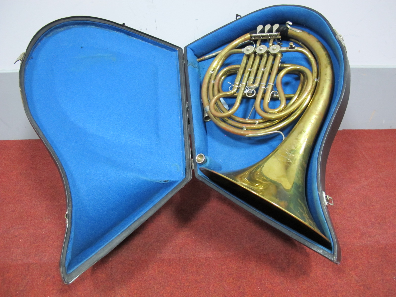 An Early XX Century Brass French Horn, by Gottwalt Lederer, Markneukirchen, with mouthpieces, fitted