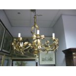 A Mid XX Century Eight Branch Gilt Effect Ceiling Light Fitting, with each branch connected and