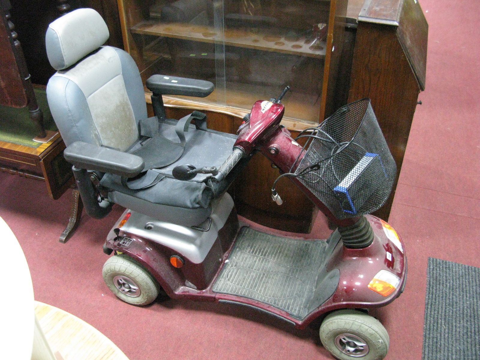 A Strider Four Wheel Mobility Scooter.