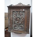 A Late XIX Century Continental Cased Oak Wall Hanging Cabinet, shaped 3/4 gallery with central