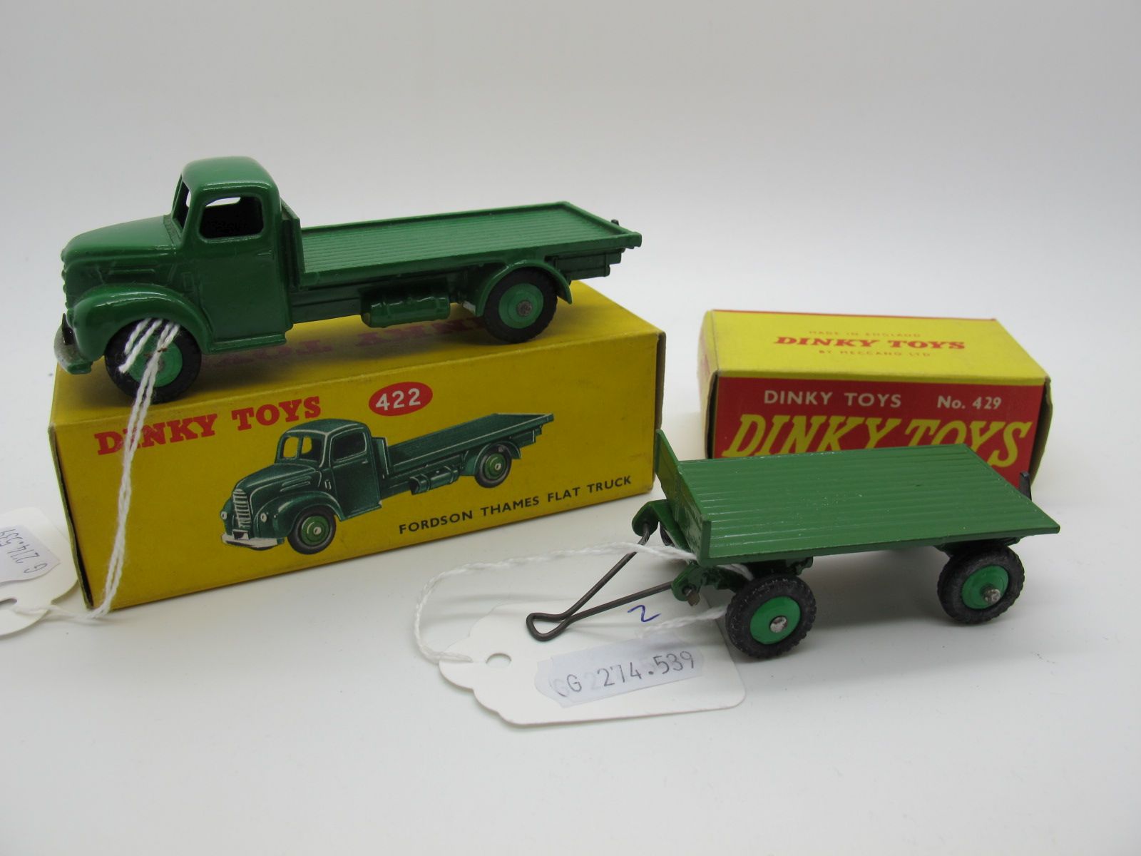 A Boxed Original Dinky #422 Fordson Thames Flat Truck, dark green body, mid green hubs, silver