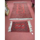 Persian Style Wool Rug, with geometric decoration, tassel ends, together with a prayer mat.