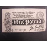 A John Bradbury First Issue One Pound Treasury Note, number F37 008710. Vertical fold and other