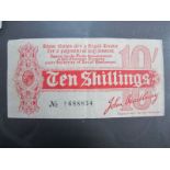 A John Bradbury First Issue Ten Shillings Treasury Note, number A1 688834. Some folding and other