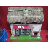 Thatched Roof, 'Dolls House Cottage', including some wooden dolls house furniture, sliding front,