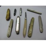 A Collection of Nine Assorted Folding Penknives, including "A Present From Isle of Man", etc. (9)