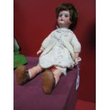 An Early XX Century German Porcelain Headed Doll By Koppelsdorf, head stamped 230-108, sleepy