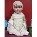 Mid XX Century German Doll, porcelain head marked '201 Germany' composition body. Approximately