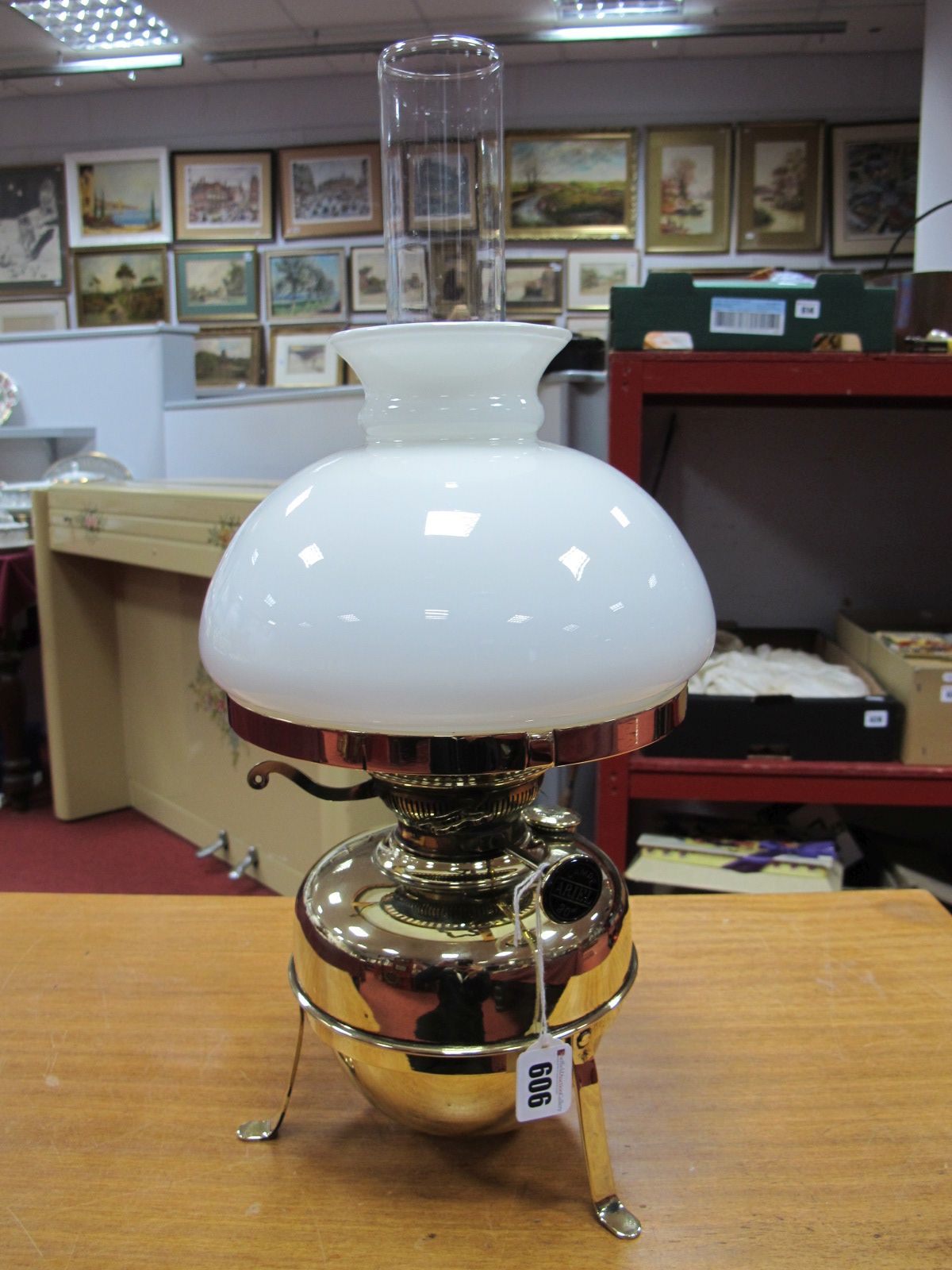 Lampe Ariel 20 Brass Oil Lamp, with glass funnel white glass shade, brass well on a brass stand.