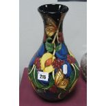 A Moorcroft Pottery Vase, decorated in the Kirke's Blue design from the Evesham Collection by Rachel