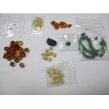 A Collection of Assorted Beads, including unmounted, faceted, etc.