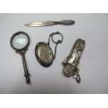 A Marcasite Set Magnifying Glass, stamped "925", a page marker, a decorative case on chain