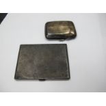 A Hallmarked Silver Slim Cigarette Case, allover engine turned, together with another cigarette