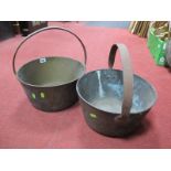 Two XIX Century Brass Jam Pans, having iron loop handles.