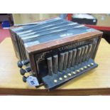 A Vintage Squeeze Box/ Accordion, marked 'Commander' Made in Germany.