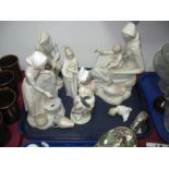 Lladro Figure, of a girl holding a bouquet of flowers, Lladro style bisque figures etc:- One Tray