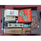 A Large Assortment of Cribbage Boards and Boxes, wooden and plastic. Also several draughts sets.