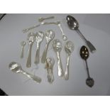 A Hallmarked Silver Fiddle Pattern Teaspoon, together with a 1935 commemorative spoon and collection