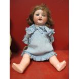 Armand Marseille Porcelain Headed Doll, sleepy eyes open mouth with teeth and wobbly tongue.