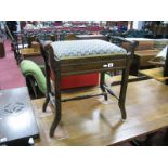 An Edwardian Piano Seat, twin turned carrying handles and hinged seat.