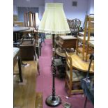 1920's Oak Standard Lamp, with a turned and barley twist pedestal, on a circular base, bun feet.