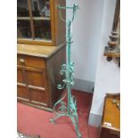 Painted Wrought Iron Adjustable Oil Lamp Stand, with scroll decoration.