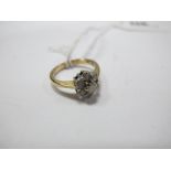 A Modern 9ct Gold Diamond Set Cluster Ring, of flowerhead design claw set, stamped ".50".