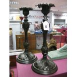 A Pair of XIX Century Style Bronzed French Candlesticks, with reeded sconces on circular stepped