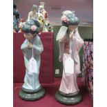 Lladro, a pair figures of Japanese Girls, on a circular bases. (Boxed)