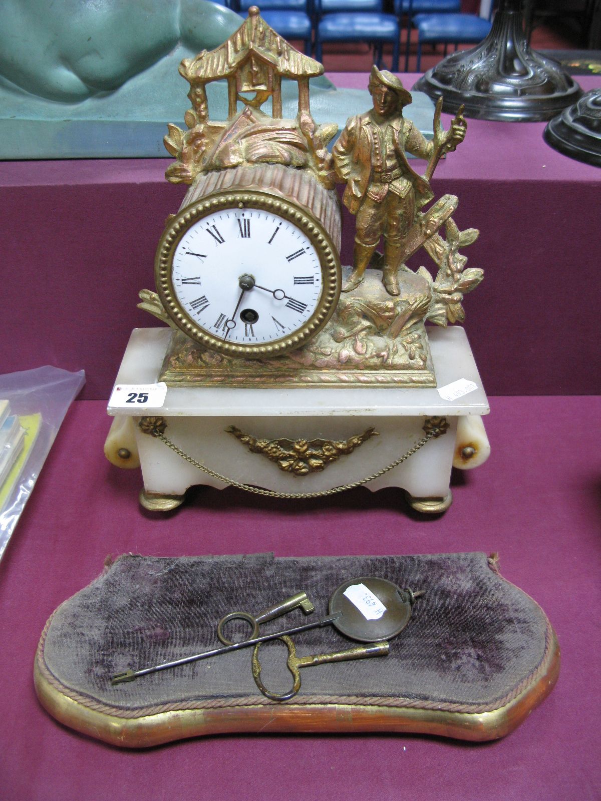 French XIX Century Metal and Alabaster Mantle Clock, with black Roman numerals to white enamel dial,