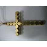 A Cross Pendant, of faceted design, inscribed "18ct".