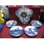 XX Century Blue White Delft Ware Wall Clock, with a central dial decorated with c. scrolls and of