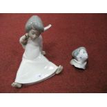 A Lladro Figurine of an angel and another the head of an angel. (2)