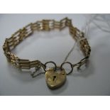 A Dainty 9ct Gold Link Style Bracelet, to heart shape padlock clasp.