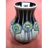 A Moorcroft Pottery Vase, decorated with the Peacock Parade design by Nicola Slaney, impressed and