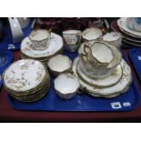 Late XIX Century Tea Service, with scalloped and floral decoration, stamped '975' on base (36